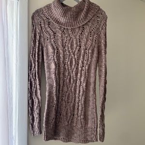 Knit long turtleneck sweater.